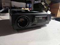 Front angled view showing lens, Kodak Carousel 650H branding and overall body condition