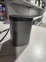Front angled view of Sonos Play:1 speaker showing grille and logo