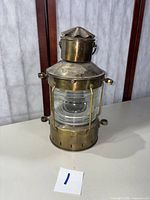 Full front view of brass Ankerlicht ship lantern