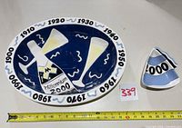 Top view of plate and small condiment dish with measurement tape