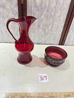 Pitcher and bowl side by side with scale reference