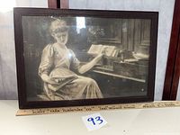 Front view of framed photogravure with ruler for scale