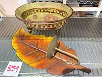 Top view of bowl on legs and front of leaf sconce