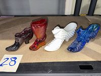 Group shot of four hobnail glass shoes showing colors and styles