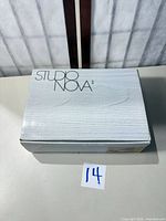 Sealed Studio Nova box top
