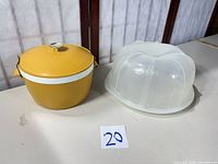 Sunfrost bowl with lid and Nordic Ware dome side by side