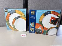 Front of both boxed sets showing pattern and contents