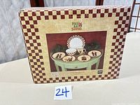 Factory box showing Folk Art Santas set image and checkerboard design