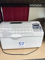 Front and top view of Zojirushi bread maker showing exterior