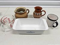 Front view of all five kitchenware items