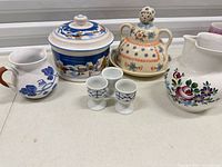 All eight pieces grouped on table