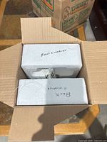 Item packed in original styrofoam inside cardboard box