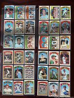 Four binder pages showing approximately 36 1972 Topps baseball cards
