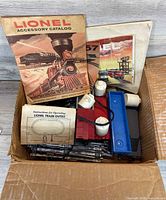 Box overview showing catalogs, transformer, track and car bodies