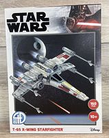 Front of sealed Star Wars T-65 X-Wing Starfighter 4D puzzle box