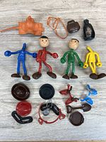 Overview of figures and accessories laid out on surface