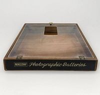 Front view of Mallory photographic batteries countertop display case
