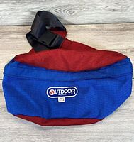 Front view showing two-tone nylon body and Outdoor Products patch