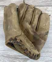 Front of vintage Rawlings Larry Jackson glove showing stamp and lacing