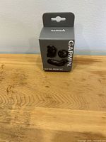 Front view of sealed Garmin seat rail mount kit box