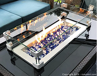 Web image of assembled MESIDA glass wind guard on fire pit