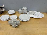 All pieces arranged on table showcasing full set counts and types