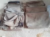 Both carpenter belts side by side on surface