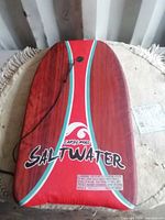 Front of kickboard showing graphics, logo and leash