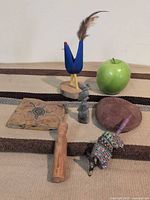 Group shot of all six items with apple for scale