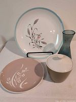 Group shot showing all four items: dinner plate, salad plate, sugar bowl, vase