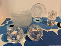 Group shot showing stacked Dansk bowls, two ice-glass votives, lucite mill