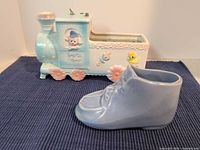 Napcoware train planter and McCoy shoe planter side by side
