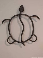 Full view of turtle wall sculpture hanging