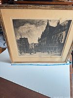 Full view of framed etching with mat and wood frame