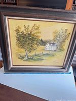 Full view of framed painting showing artwork, frame style, and overall condition