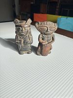 Front view of both terracotta figurines