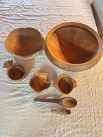 All seven wooden items laid out on table