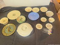 Full lot showing all ceramic pieces and hair comb