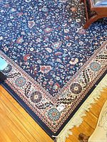 Corner view showing pattern, border, fringe condition