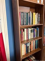 Front view of entire bookcase filled with books