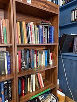 Front view showing entire bookcase with shelves