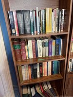 Three shelf view of assorted law and labour books