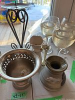 Group shot showing multiple candle holders of various materials