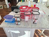 Group view of all plastic containers on countertop