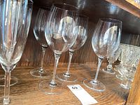 Wine glasses and other stemware on shelf