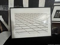 Framed pigment print angled view