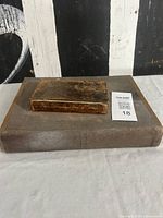 Closed view of both books showing size comparison and wear