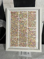 Front view of framed multicolor dot print