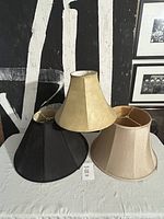 All three lampshades grouped together showing colors and shapes