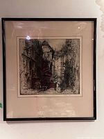 Full view of framed etching on wall